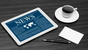 robo advisor news-tablet-coffee cup