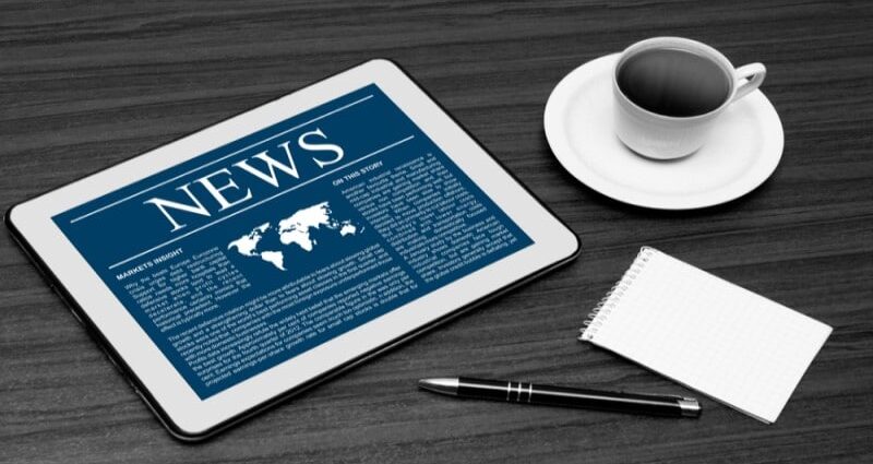 robo advisor news-tablet-coffee cup